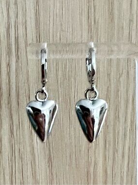 Pretty Bird 14k White Gold
Plated Huggie Hoop
Earrings with Dangling Hearts